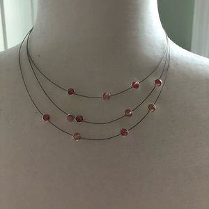 Pink stone wired necklace.